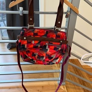 Baggallini purse multi-color with shirt and cross-body staps